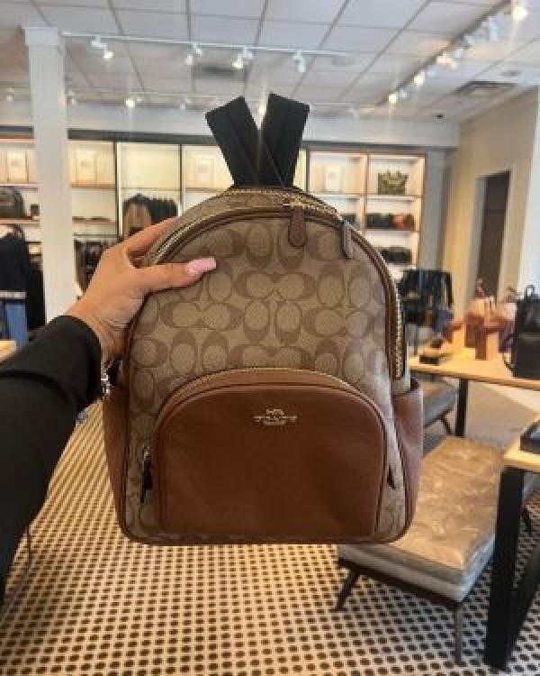 Coach_backpack premium quality with dust cover